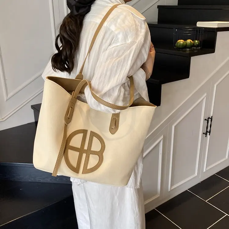 

Элегантная кожаная классическая дизайнерская сумка для подгузников в парижском стиле, большая вместительная сумка для женщин, лучшая модель Superstar Show Elegant Messenger