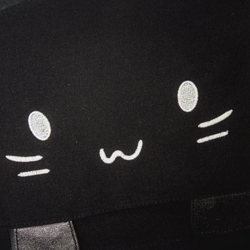 2025 gato saco de escola bonito bordado lona mochila dos desenhos animados gatinho pata mochila para crianças presente natal para a menina