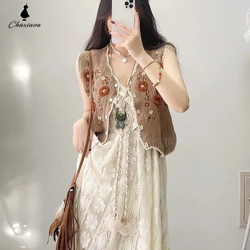 

2024 Spring and Summer Hollow Tassel Lace Suspender Dress V-neck French Romantic Retro Irregular Seaside Vacation Beach Skirt