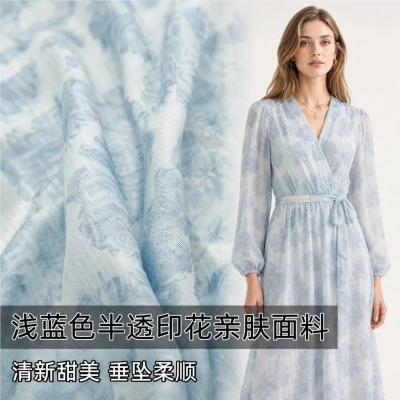 A and sweet semi-transparent light blue printed skin-friendly cut-out fabric shirt designed by fashion designer