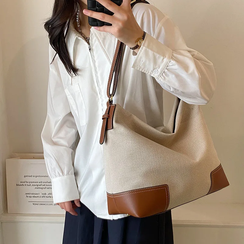 

Large capacity fashionable tote bag for women 2023 cross-border new canvas shoulder bag, simple and high-end texture crossbody