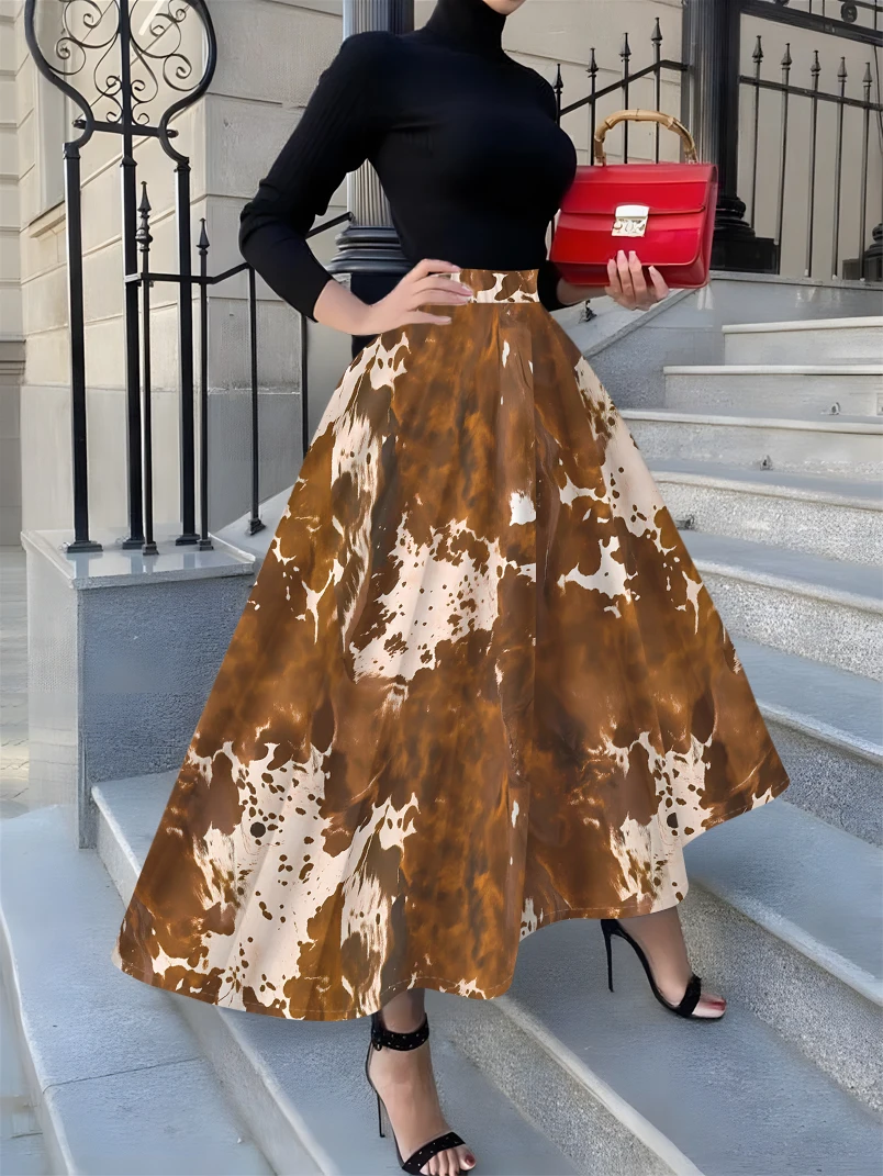 

Полуюбка с принтом в коричнево-белых тонах с коровьим принтом, повседневный стиль, на все сезоны.