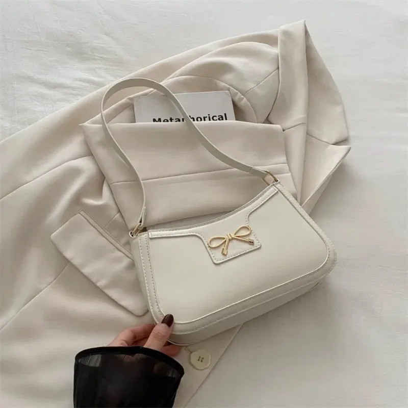 Damen-Achseltasche mit einfarbigem Temperament, einfache Premium-Sense-Schleife für Pendler, Umhängetasche für Damen