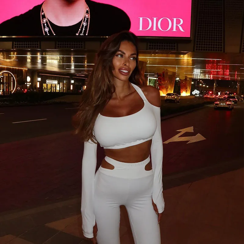 Ensemble tendance pour femme, style européen et américain, comprenant un boléro bandeau asymétrique à col croisé et un pantalon patte d'éléphant taille haute, coupe ajustée, style 'Hot Girl'