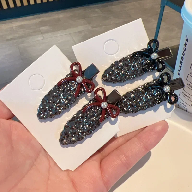 

Premium sense metal irregular polka dot bow seamless clip sweet and cool temperament side clip bangs clip hair accessories