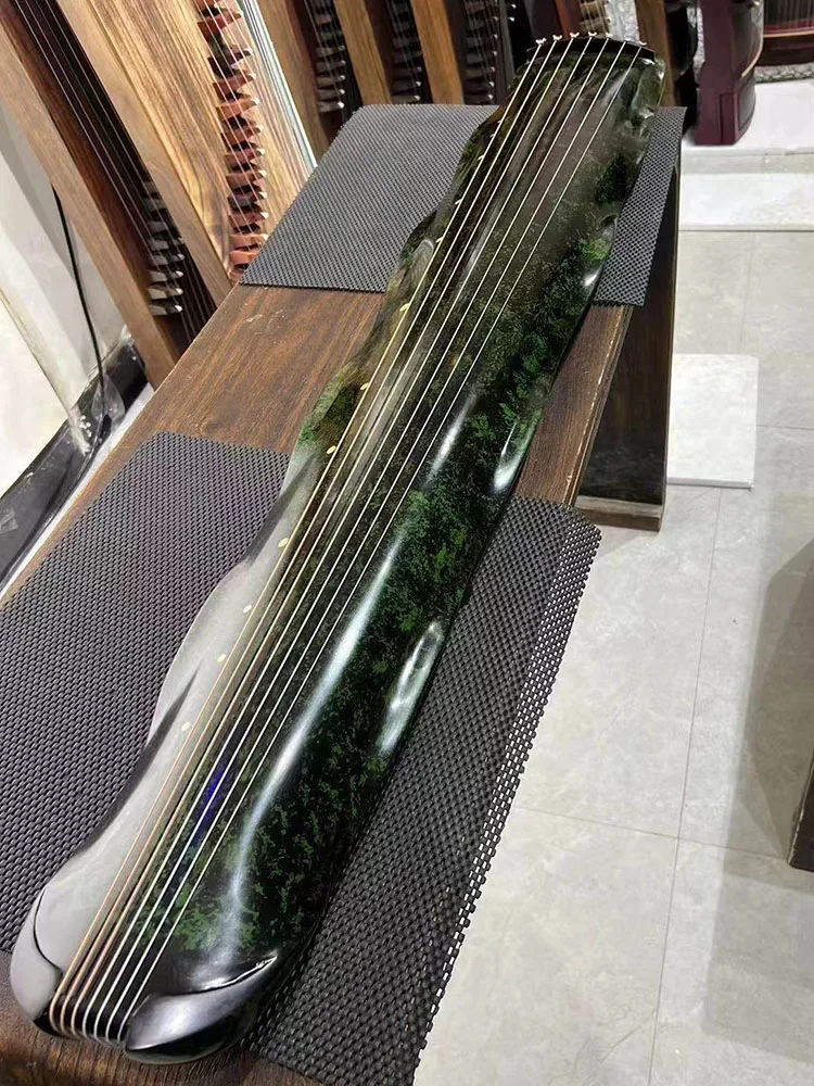 

Handmade Tradition Guqin Banana Leaf Style Playing Guqin Professional Performance 7 String Qin Ancient China Musical Instruments
