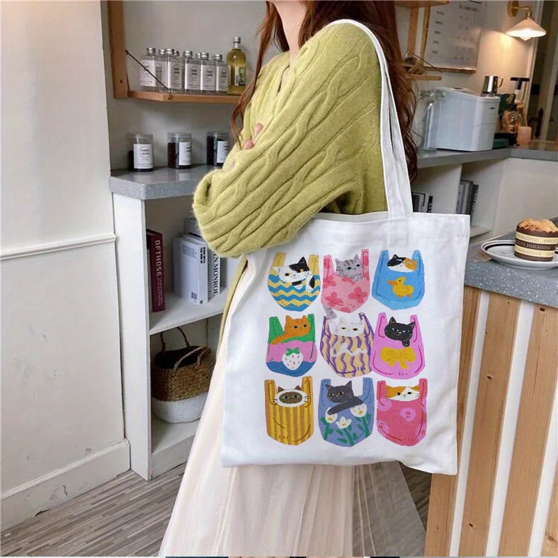 A Cute Single Tote Bag Featuring a Cartoon Cat Design, Perfect for Casual Outings. This Canvas Tote Bag Is an Ideal Birthday Gift for Friends, Mothers and Daughters, and Is Suitable for Teenagers.