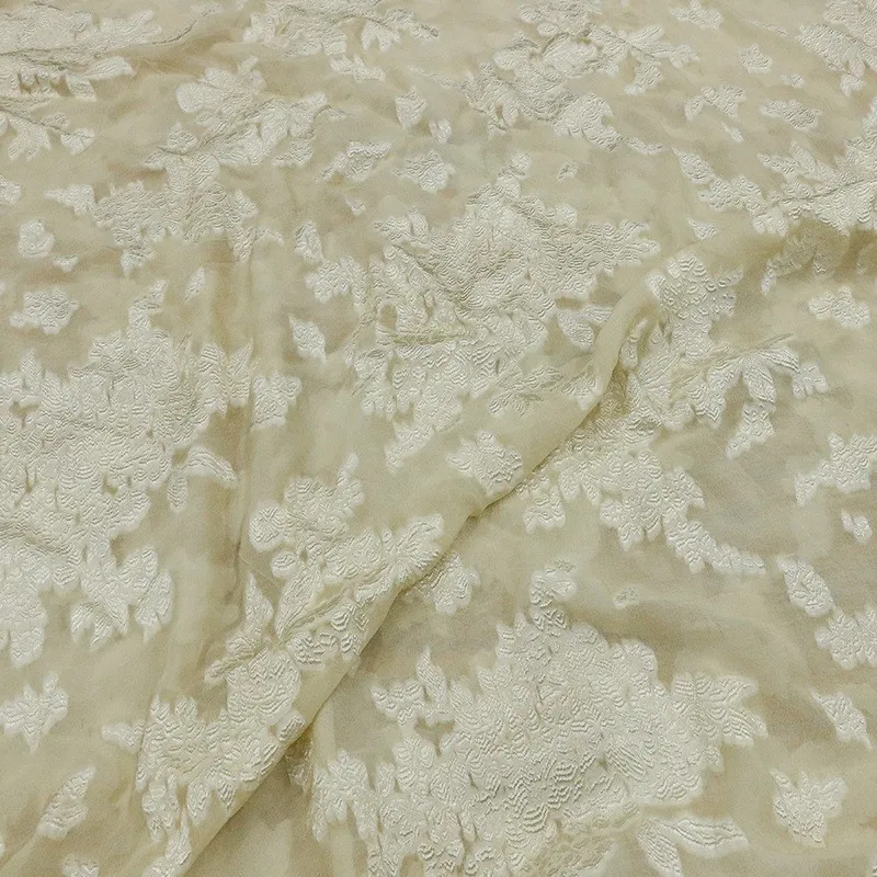 

This is a niche designer fabric made of silk with light apricot dyeing technique and stir-fried color