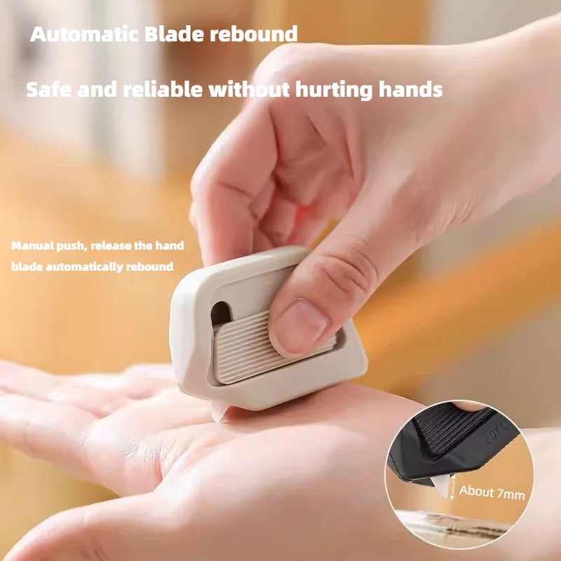 Coupe-boîte à aspiration magnétique, rebond automatique n'endommage pas les mains, le couteau de déballage en céramique est Compact et Portable