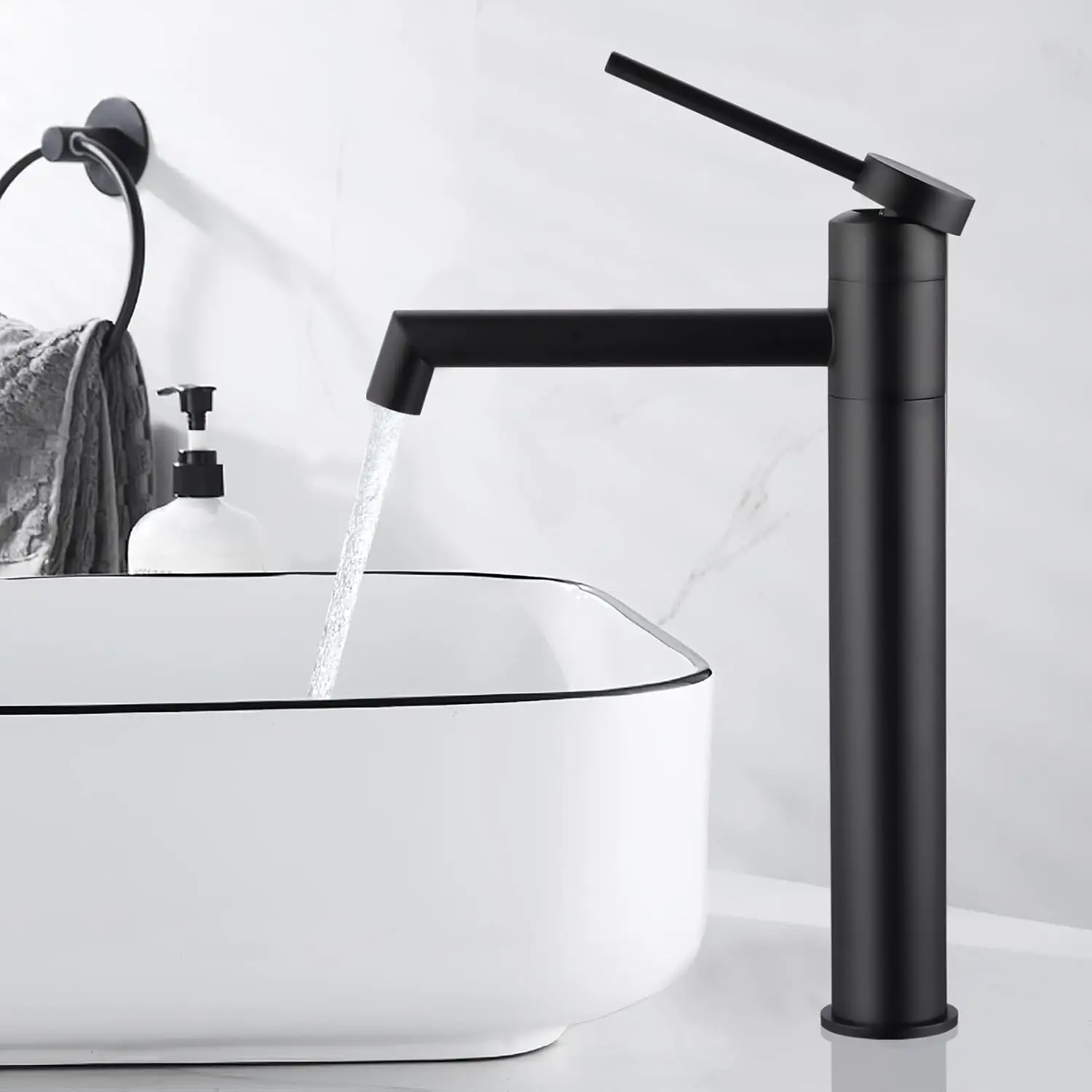 Grifo moderno de acero inoxidable para lavabo, montado en el encimera, con mezclador de agua fría y caliente para baño y cocina.