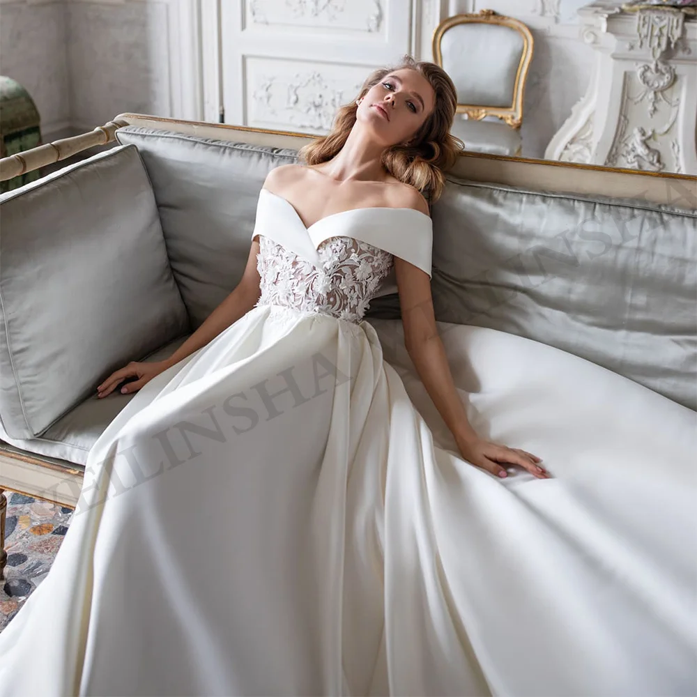 Vestido de novia de satén clásico con hombros descubiertos, cuello en V, apliques transparentes de flores, línea A, tren de corte, vestido de novia con bolsillos