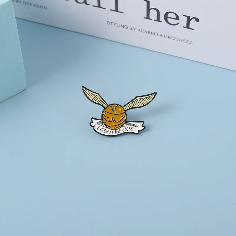 Golden Snitch Enamel Pins Creative Ball with Wings Brooch Bag Lapel Button Badge Funny Movie Jewelry Gift for Kids Fans Friends