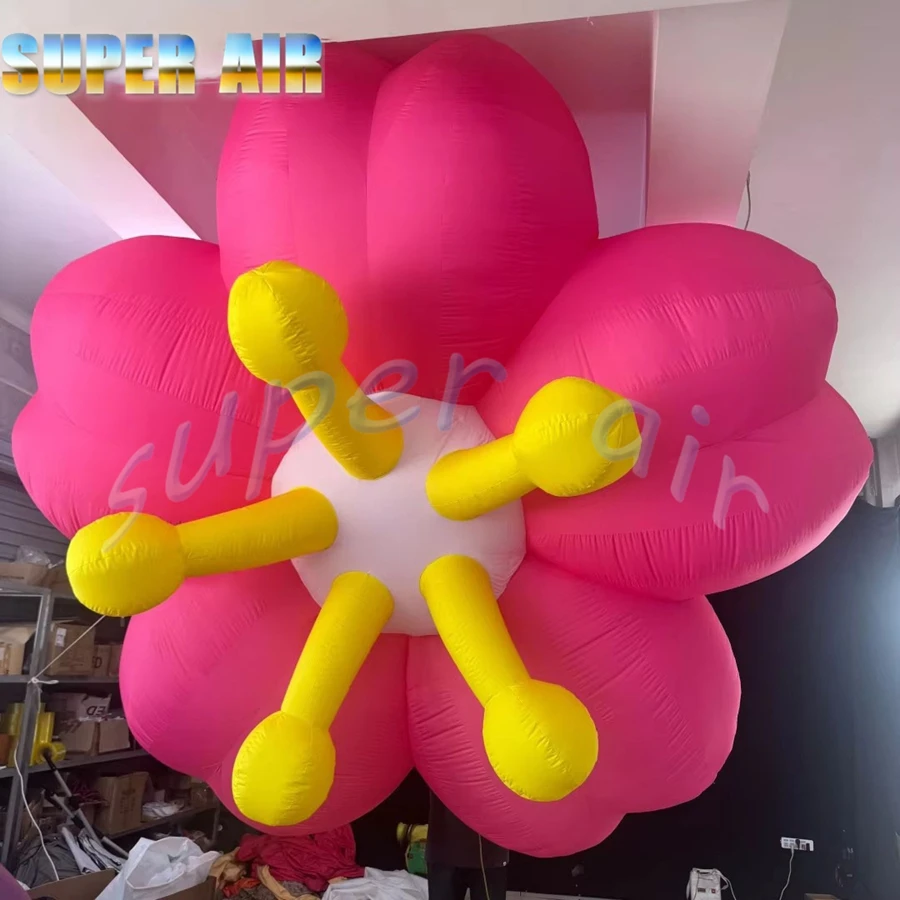 Modelo de planta enorme súper aire utilizado para publicitar una flor rosa inflable huanging