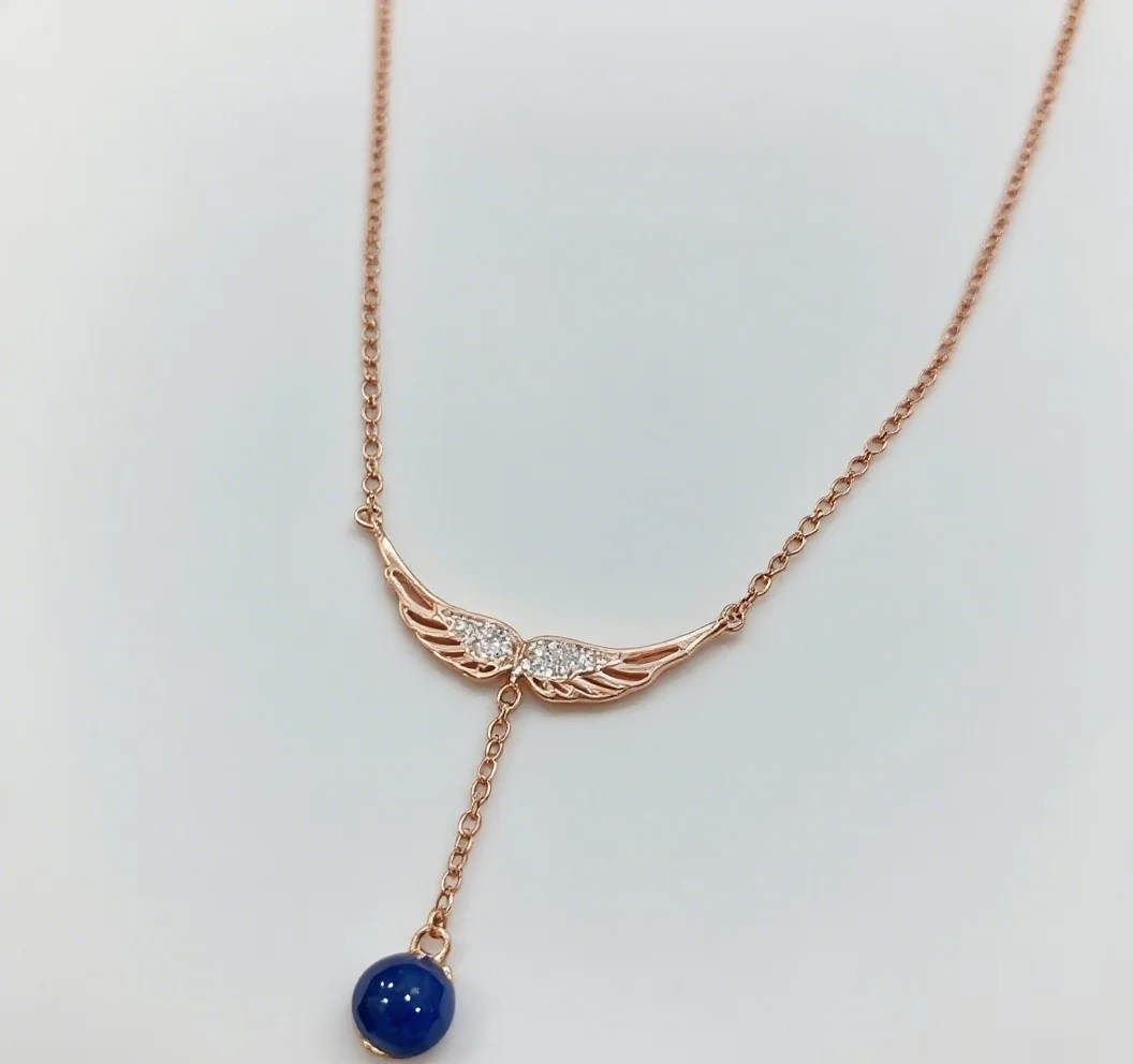 

Pure Silver Pendant with Natural Dominican Blue Amber 5mm Core Hollow Angel Wings Design Symbolizing Freedom and Protection