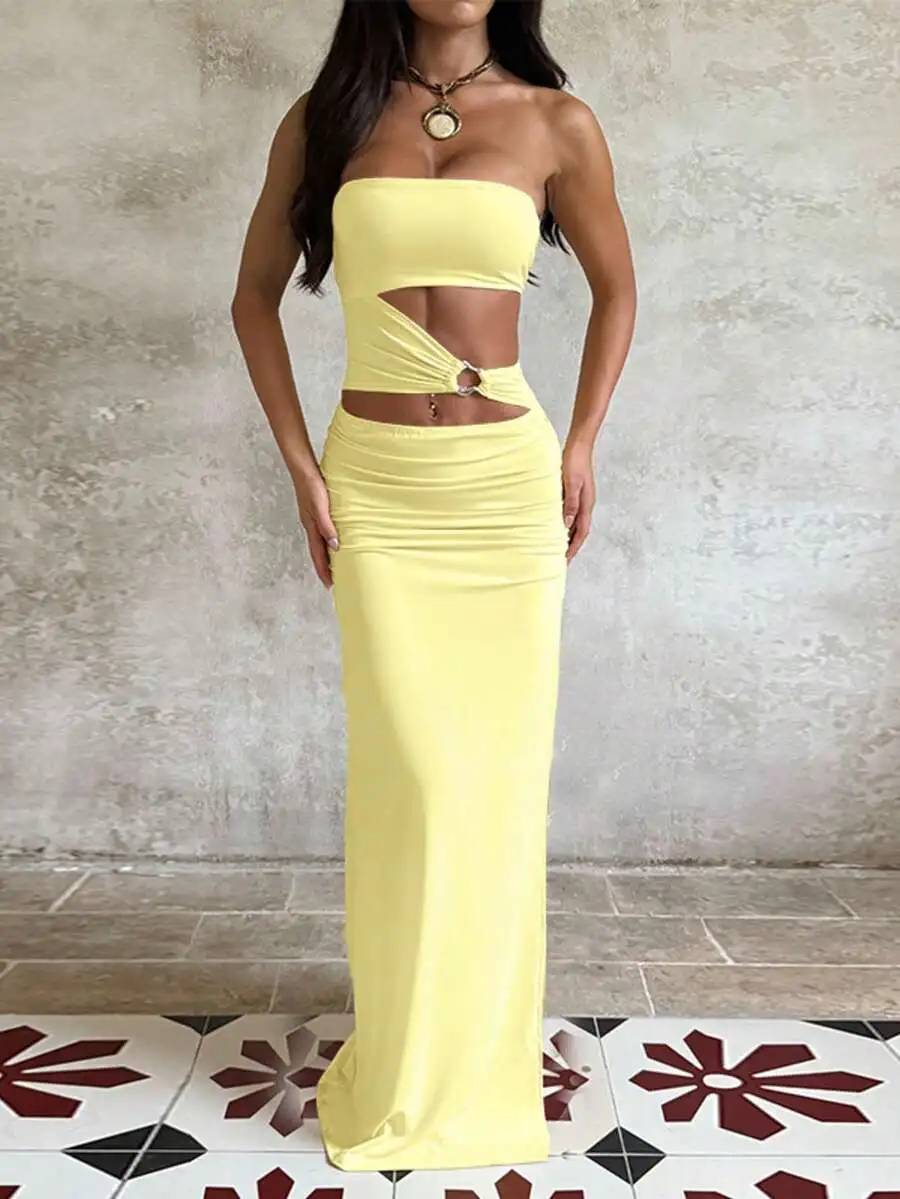 

Желтое макси-платье без бретелек с вырезами и декоративной завязкой