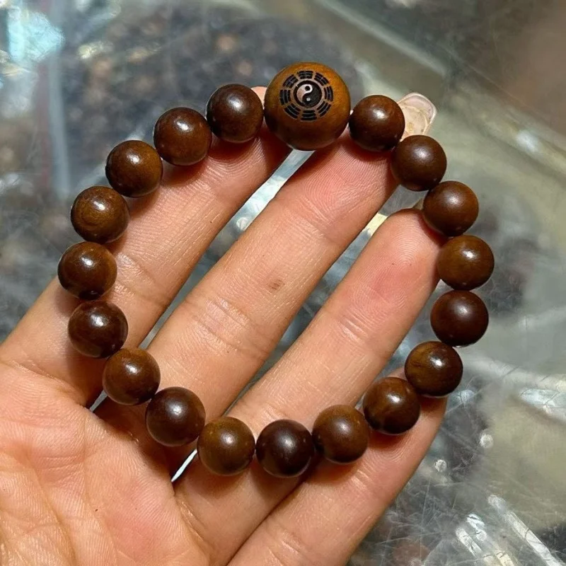

Natural lightning-striken jujube bracelet with carved pendant, made from old dark-colored wood, highly polished, Taoist sty