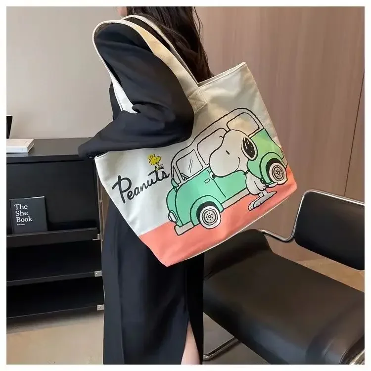Snoopy Girl Neue niedliche Cartoon-Mode, vielseitig einsetzbar, lässig, für Reisen, leicht, große Kapazität, Aufbewahrung, tragbare Umhängetasche aus Segeltuch – Detail 2
