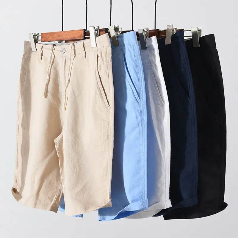 Pantaloncini in lino di cotone per uomo estate nuovi pantaloncini da vacanza larghi dritti bianchi solidi uomo Casual Button Fly pantaloni corti 037