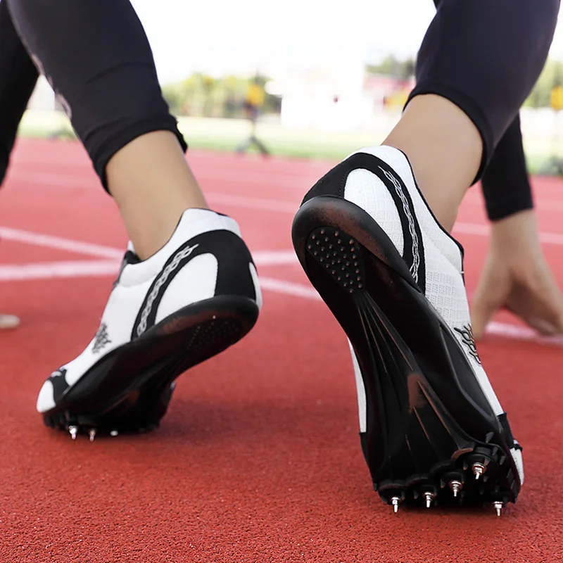 Chaussures à pointes de piste pour hommes et femmes, baskets de course unisexes, chaussures de sport de saut de course, chaussures d'athlétisme, taille 45