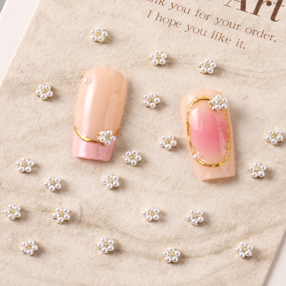 ชุดตกแต่งเล็บลายดอกไม้มุก 20 ชิ้น ดอกไม้สีขาวขนาดเล็ก ชาร์มตกแต่งเล็บ เครื่องประดับเล็บ หมุดยึดตกแต่งเล็บ อุปกรณ์ทำเล็บ