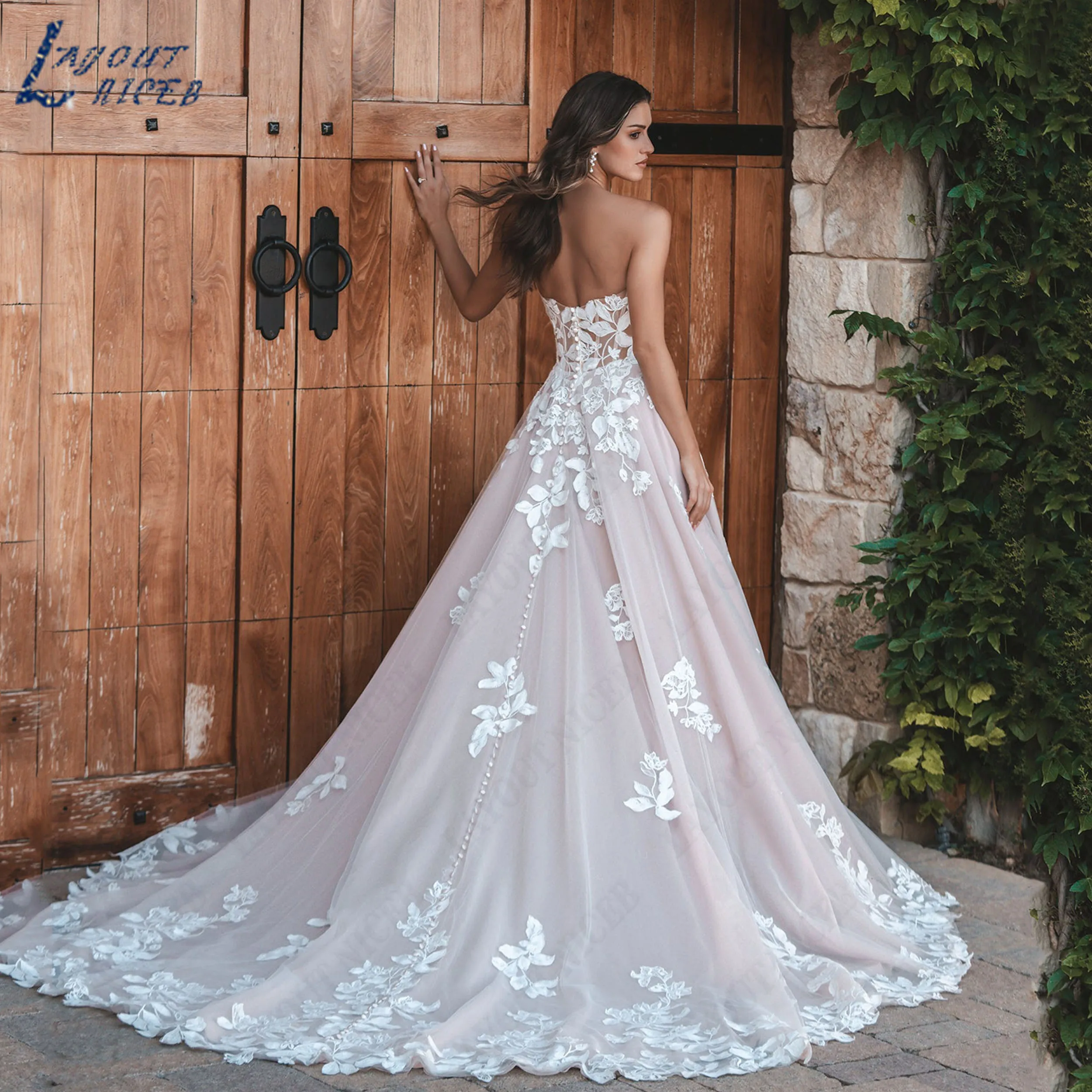 LAYOUT NICEB Customized Strapless Deep V Tulle 2026 Wedding Dress Lace Applique Sleeveless A Line Bridal Gown vestido de noivas