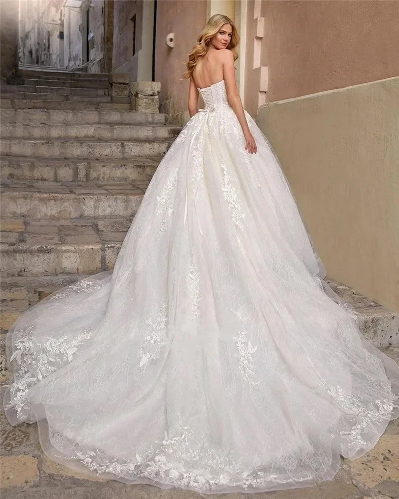 

Свадебное платье Flavinke на заказ: элегантное, сексуальное, без бретелек, с аппликациями и вышивкой, для женщин.