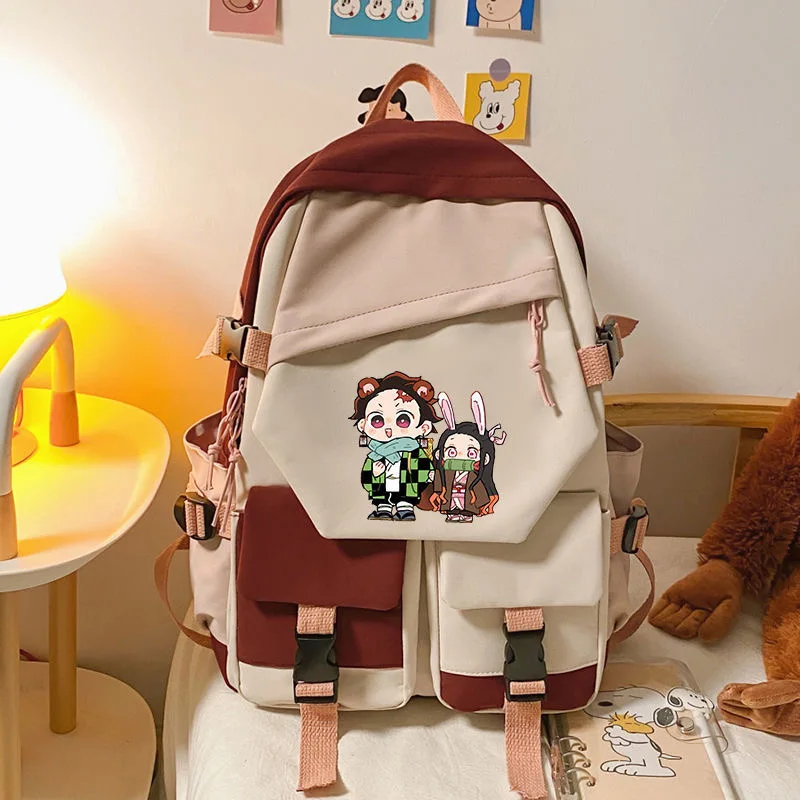 Anime Demon Slayer Print Color Blocking zaino Teenarges zainetto ragazze ragazzi moda Laptop borse a tracolla da viaggio Mochila