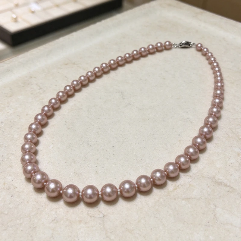 Collar de perlas casi redondas de color lila claro para mujer, de 17 pulgadas y 9-10 mm, con superficie lisa y vetas naturales, un regalo de joyería clásico.