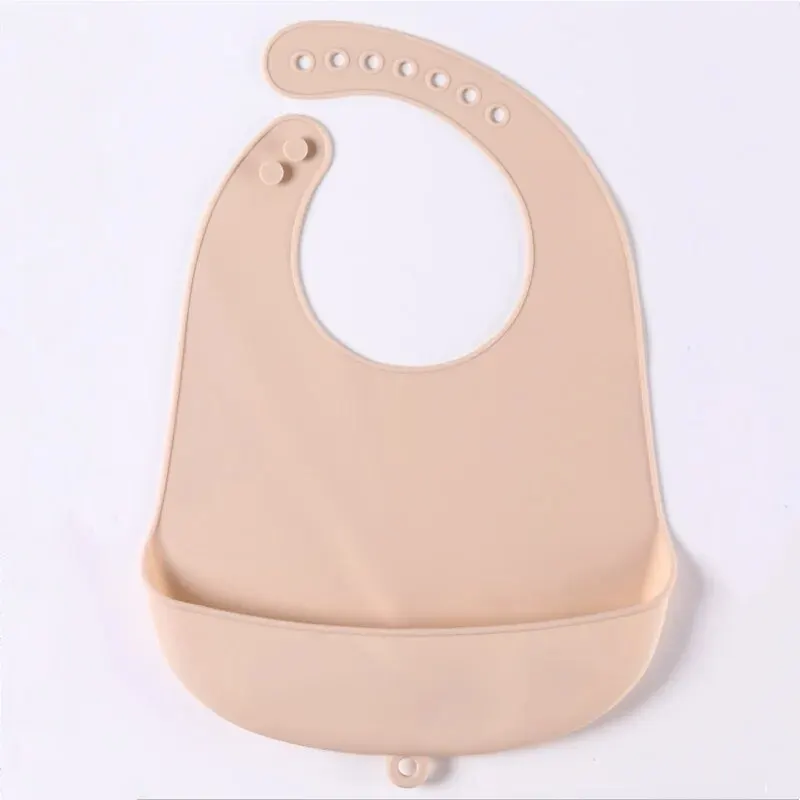 El babero para alimentar al bebé está hecho de silicona y tiene un diseño resistente al agua. Es adecuado para fines de alimentación.