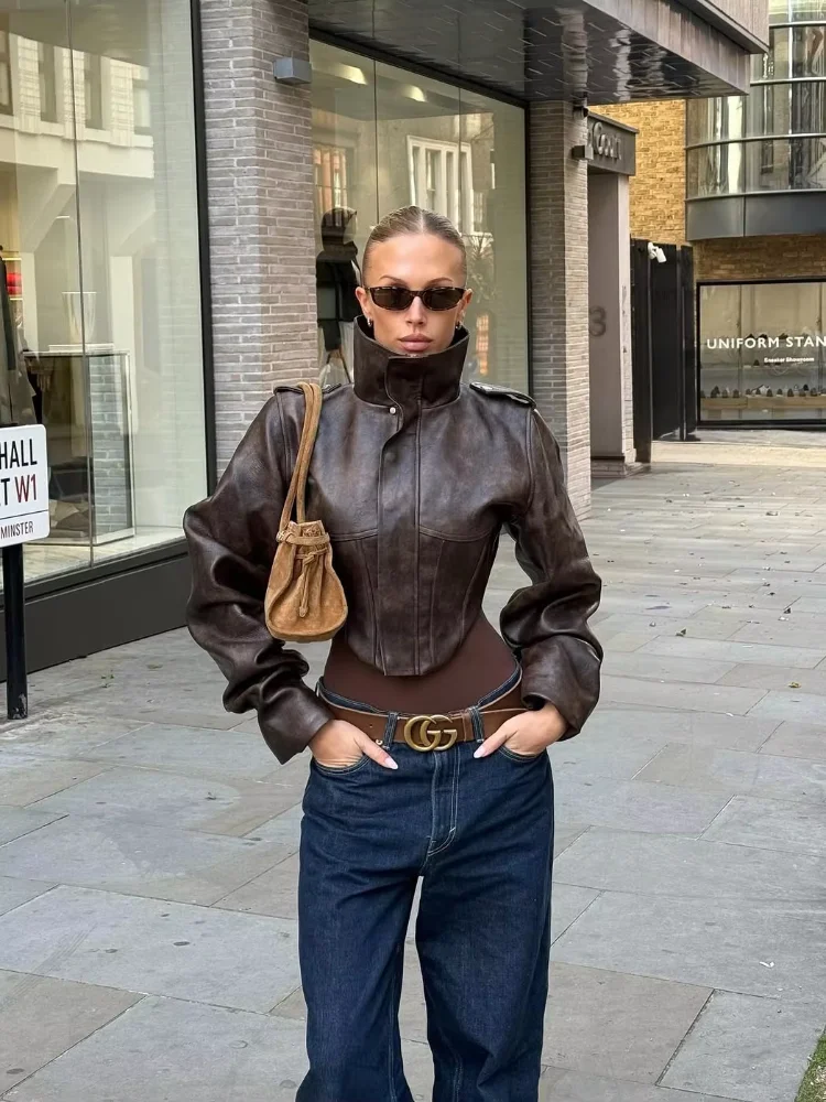 Giacca da donna in pelle con chiusura in vita Moda retrò Colletto alla coreana Manica intera Cerniera Fibbia Giacche corte 2026 Lady Street Outwear