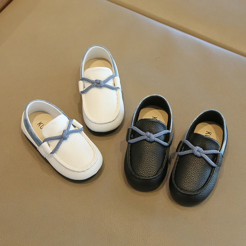 

2026 Fashion Boys Slip-on Flat Loafers New Braided Knot Decor Kids Leather Shoes Black White Solid Color Children Moccasin Shoes