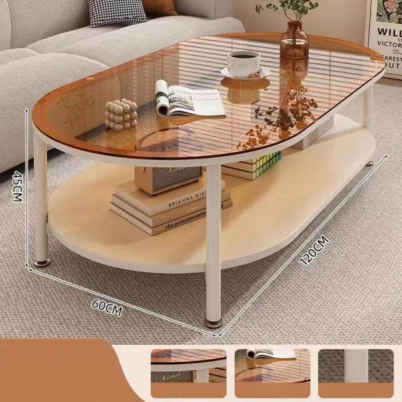

Modern cream-style coffee table, oval with corrugated glass top and two metal storage shelves