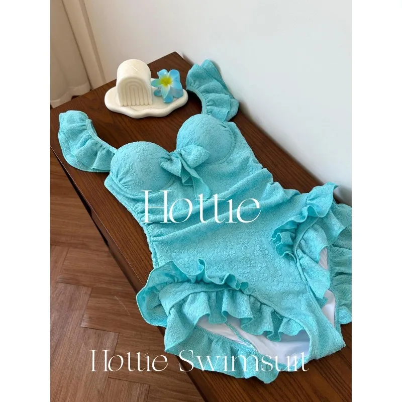 【Girl Blue】ชุดว่ายน้ําวันพีชสีขาวมิ้นท์สีน้ําเงินฤดูร้อน ขายึดเหล็กรวบรวมชุดว่ายน้ํานักเรียนแบบอนุรักษ์นิยม ชุดความปรารถนาอันบริสุทธิ์