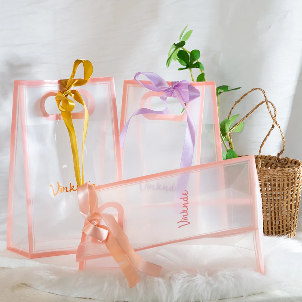 

Clear Plastic Gift Bags with Handle Custom Logo Transparent PP Candle Wrap Bow Tote Bag for Wedding Bridal Shower Birthday Party