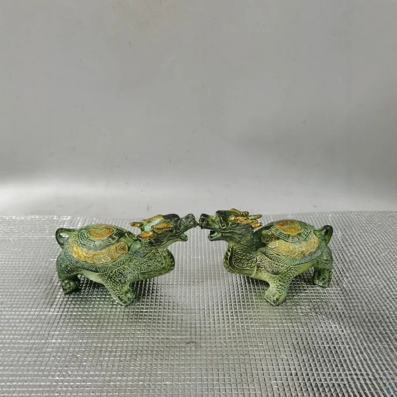 

A pair of bronze turtle ornaments with eight-trigram money dragon heads, suitable for home and office decoration, gifts,