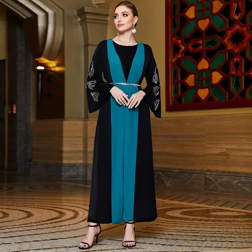 Black horn sleeves spliced with lake blue temperament, outer fit, Middle Eastern fashion temperament, slim and thin, elegant clo