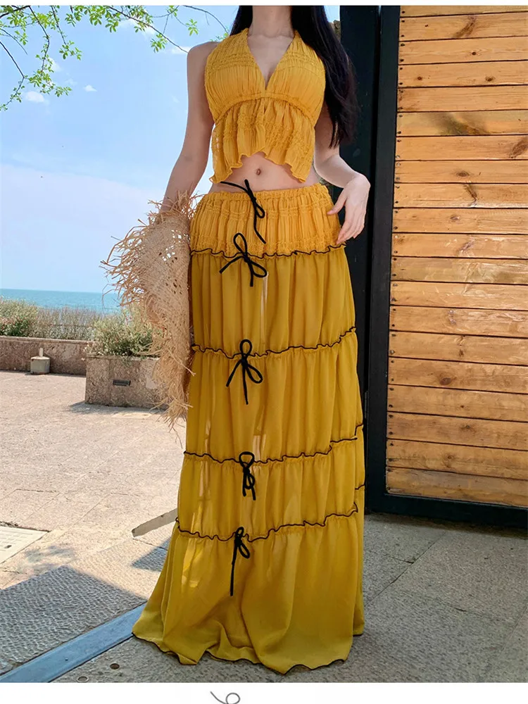 

Праздничная мода Желтый Бежевый комплект из 2 предметов с открытой спиной и лямкой на шее Короткий жилет Майка Топ и длинная юбка с бантом Летнее морское платье макси из 2 предметов