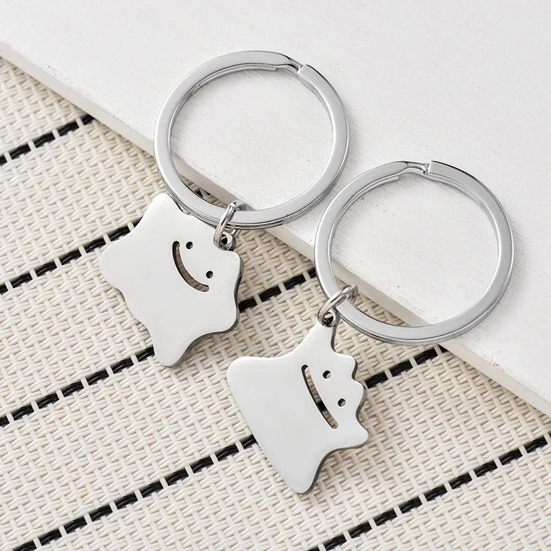 Novo idto oco chaveiro bonito tendência titânio aço saco de escola chave do carro pingente casal novo trinket amigos presente chaveiro
