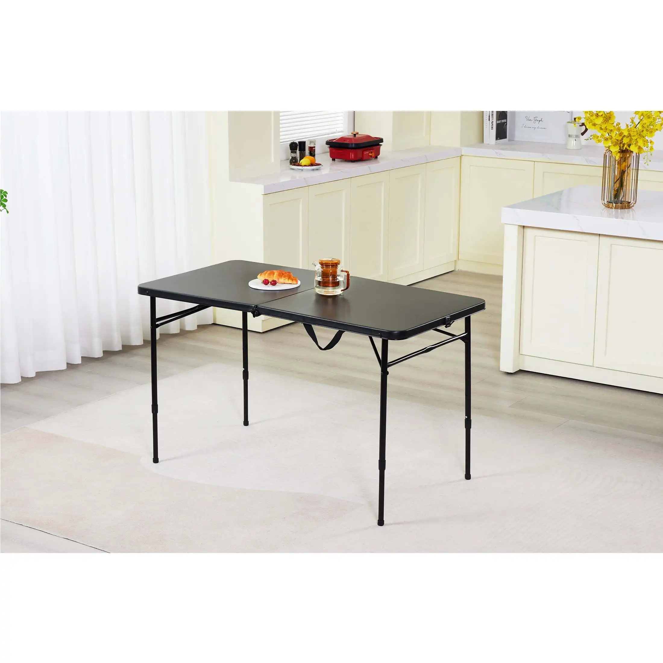 This 4-foot adjustable folding table can be easily folded in half for easy storage. Classic black design, simple and beautiful