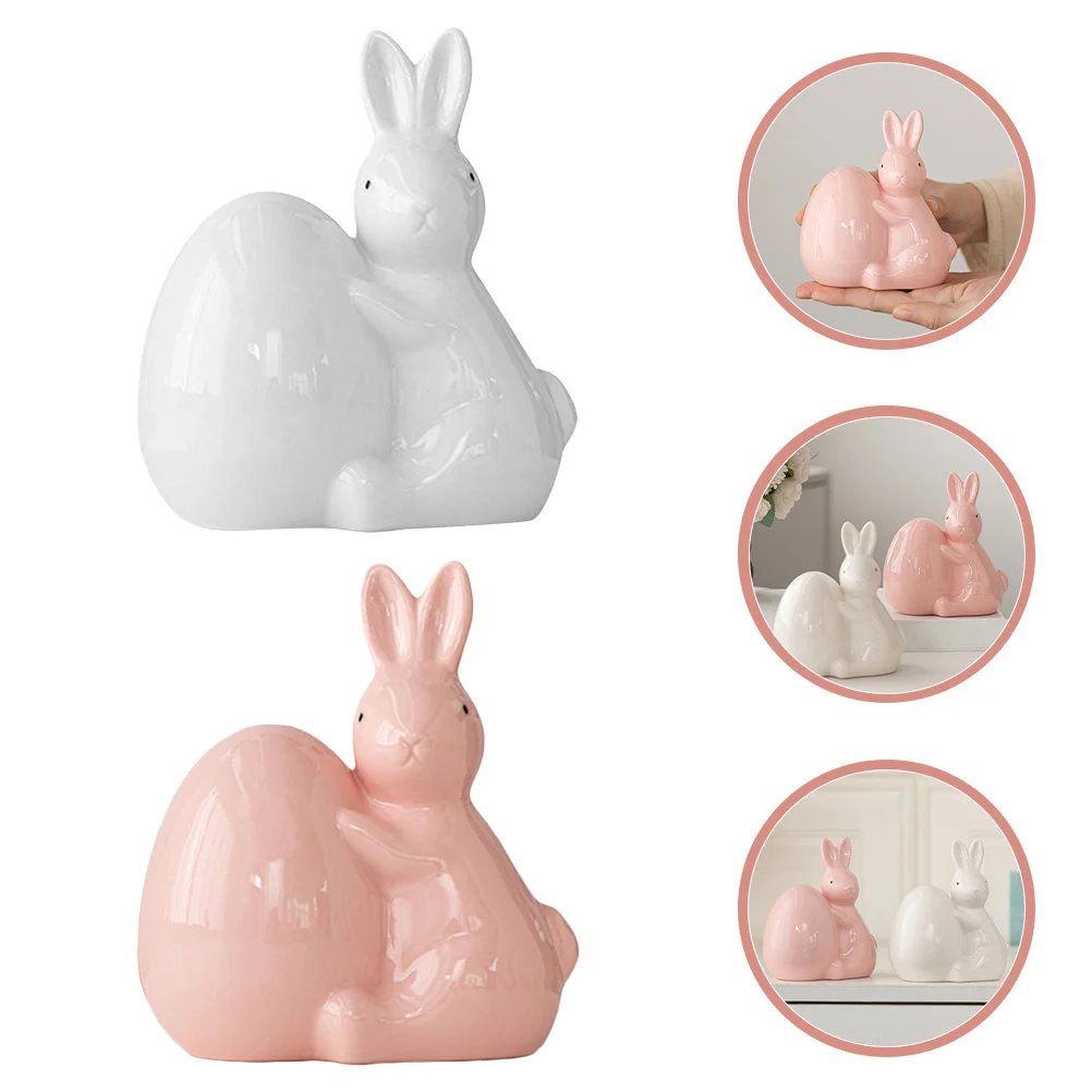 

2Pcs Easter Ceramic Rabbit Home Decor Bunny Holding Egg Spring Table Centerpiece Cute Desktop Ornament for Living Room Shelf