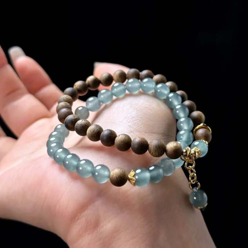

Natural Blue Water Jade Double Loop Bracelet Agarwood Layered Light Luxury Women's Bracelet with Golden Lotus Pendant Gifts