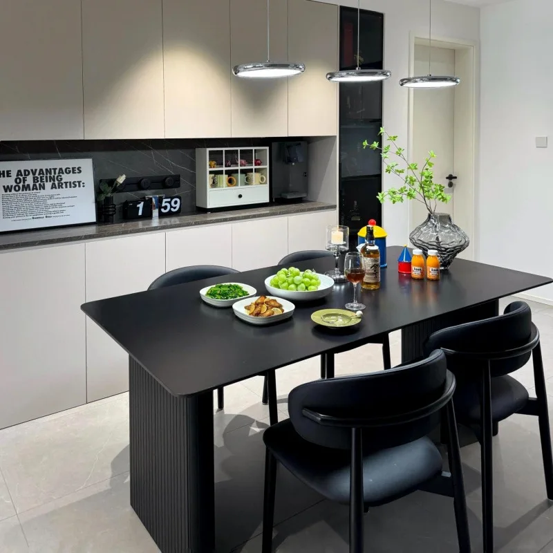 Rock slab dining table and chair combination pure black small apartment home creative rectangular dining table