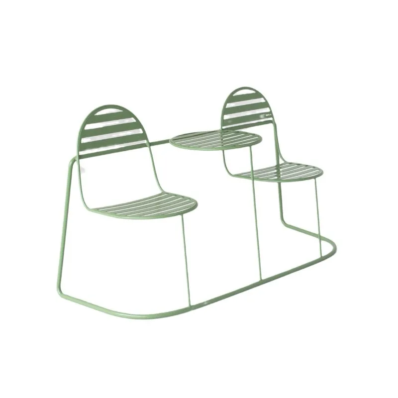 

One-piece tables and chairs, wrought iron chairs in the park camping base