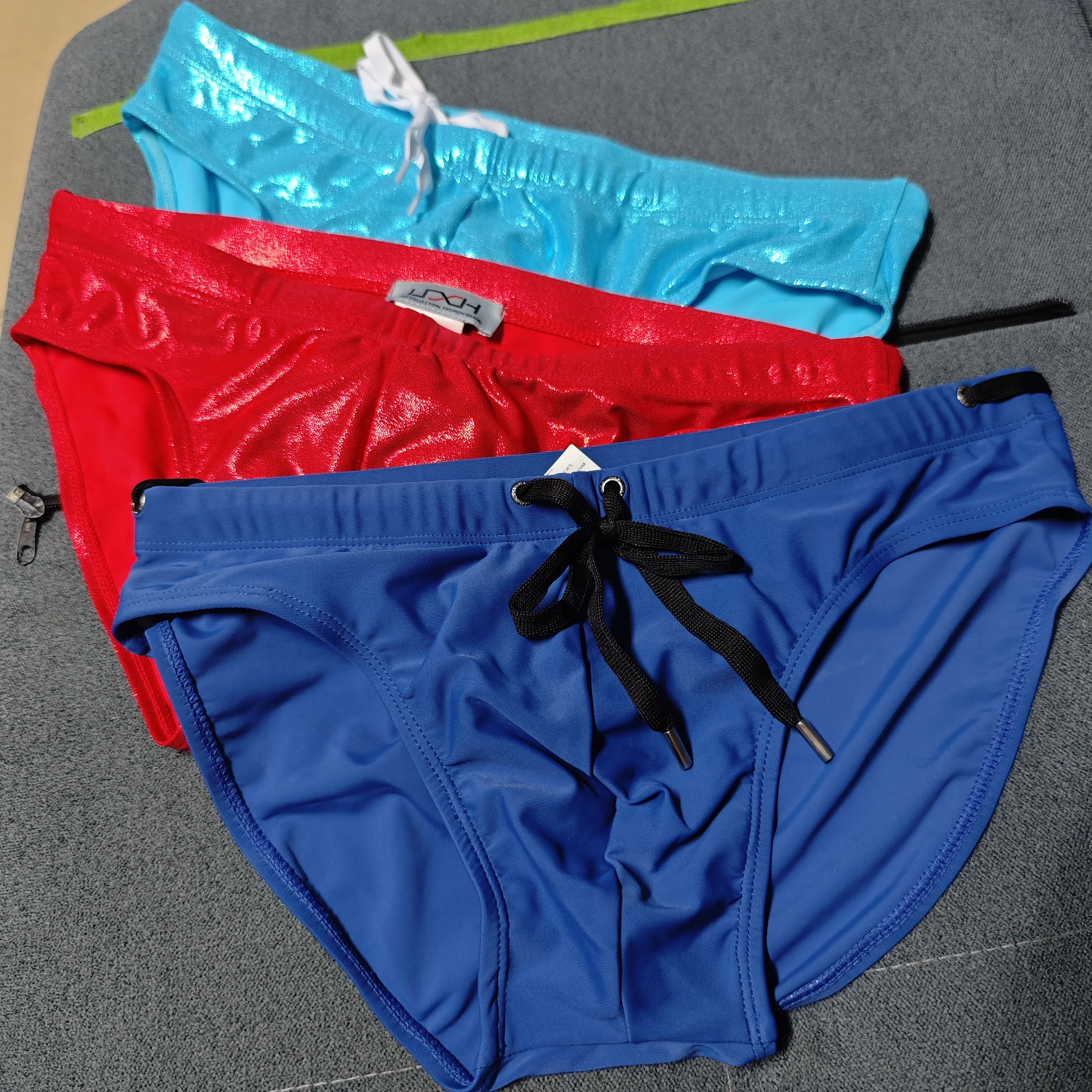 2026UXH European and American men's high-fork triangle swimming trunks fashion color matching simple beach low waist UXH325