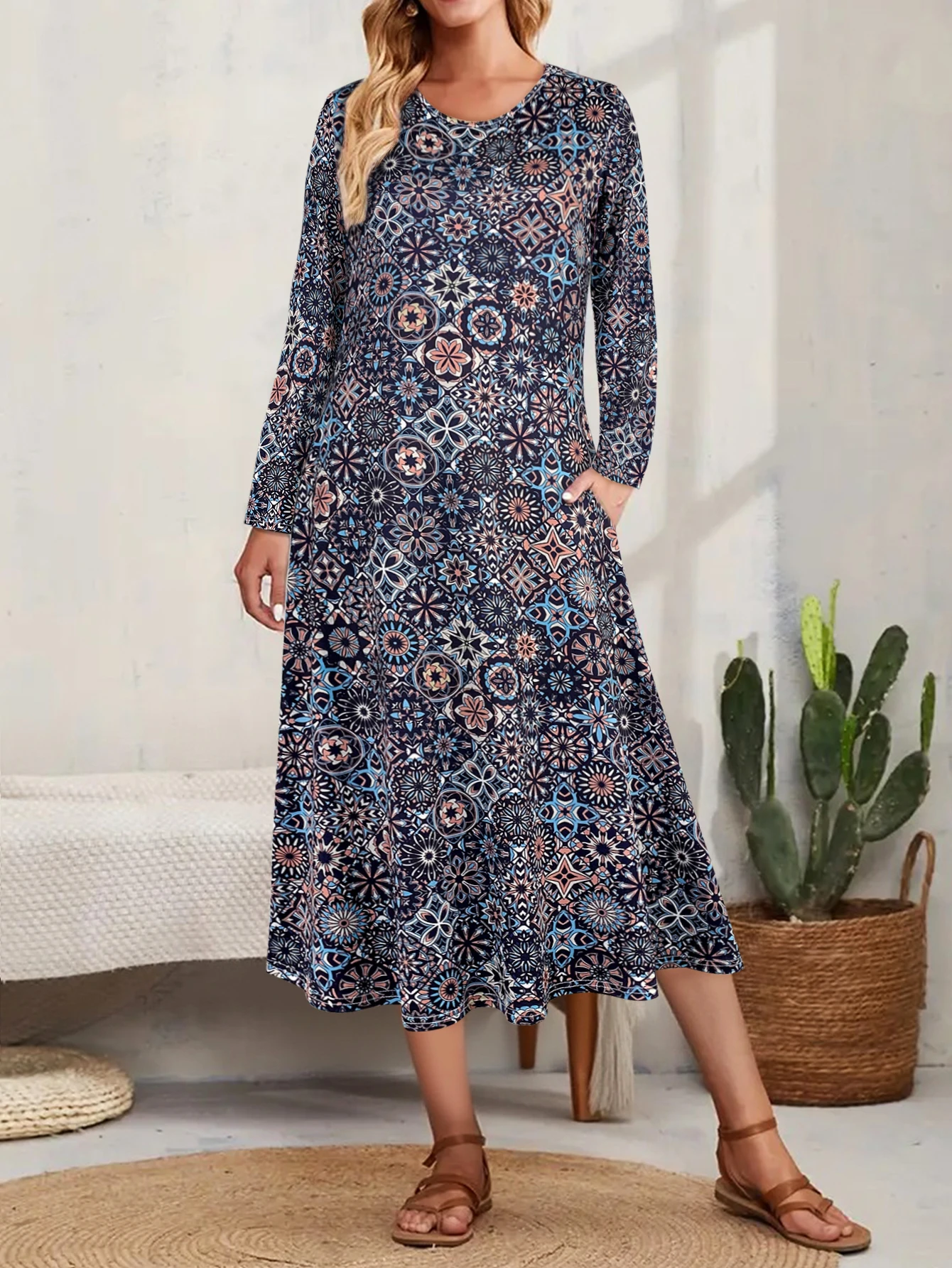 Damska sukienka midi z długim rękawem i okrągłym dekoltem, z wyrafinowanym, wielokolorowym, geometrycznym wzorem kwiatowym, w stylu casual boho i do noszenia na co dzień.