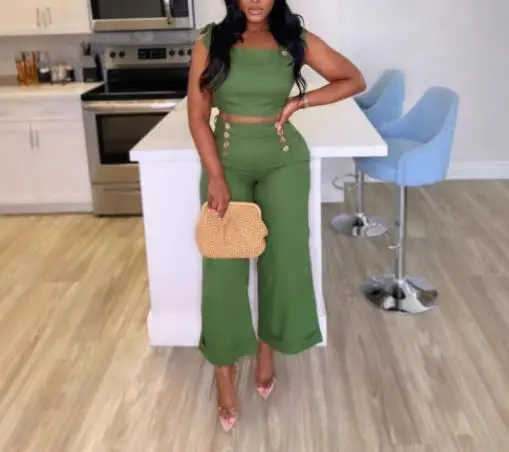 

Комплект из двух предметов. Женский наряд. Лето 2025 г. Новый элегантный укороченный топ со шнуровкой на плечах и широкие брюки с высокой талией.