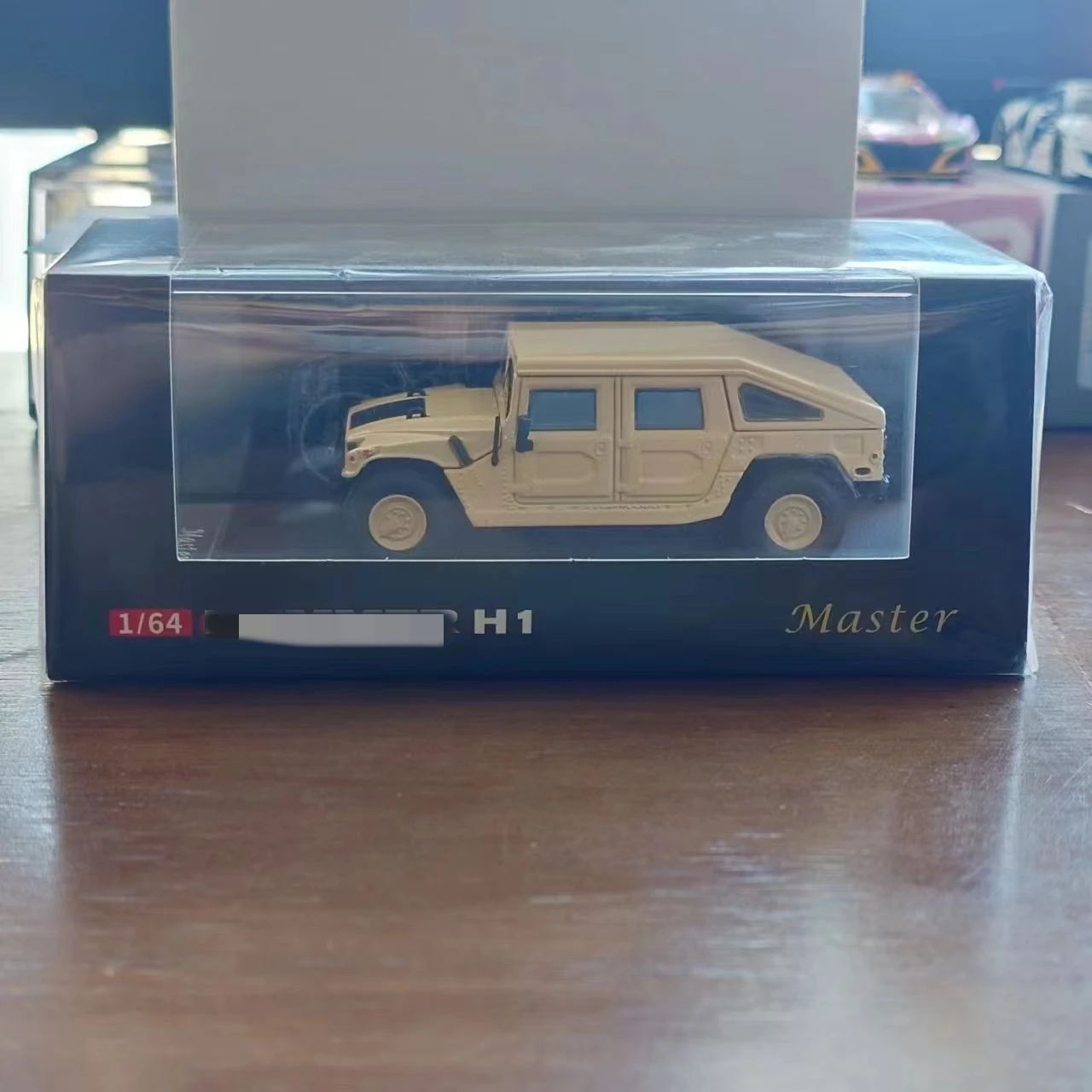 Master 1:64 H1 (geel) gegoten modelauto