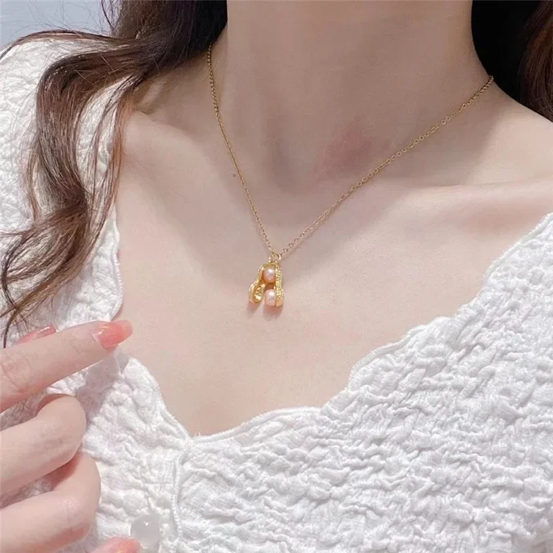 

New trendy and minimalist freshwater pearl personalized peanut pendant ins, cool and fashionable necklace accessories
