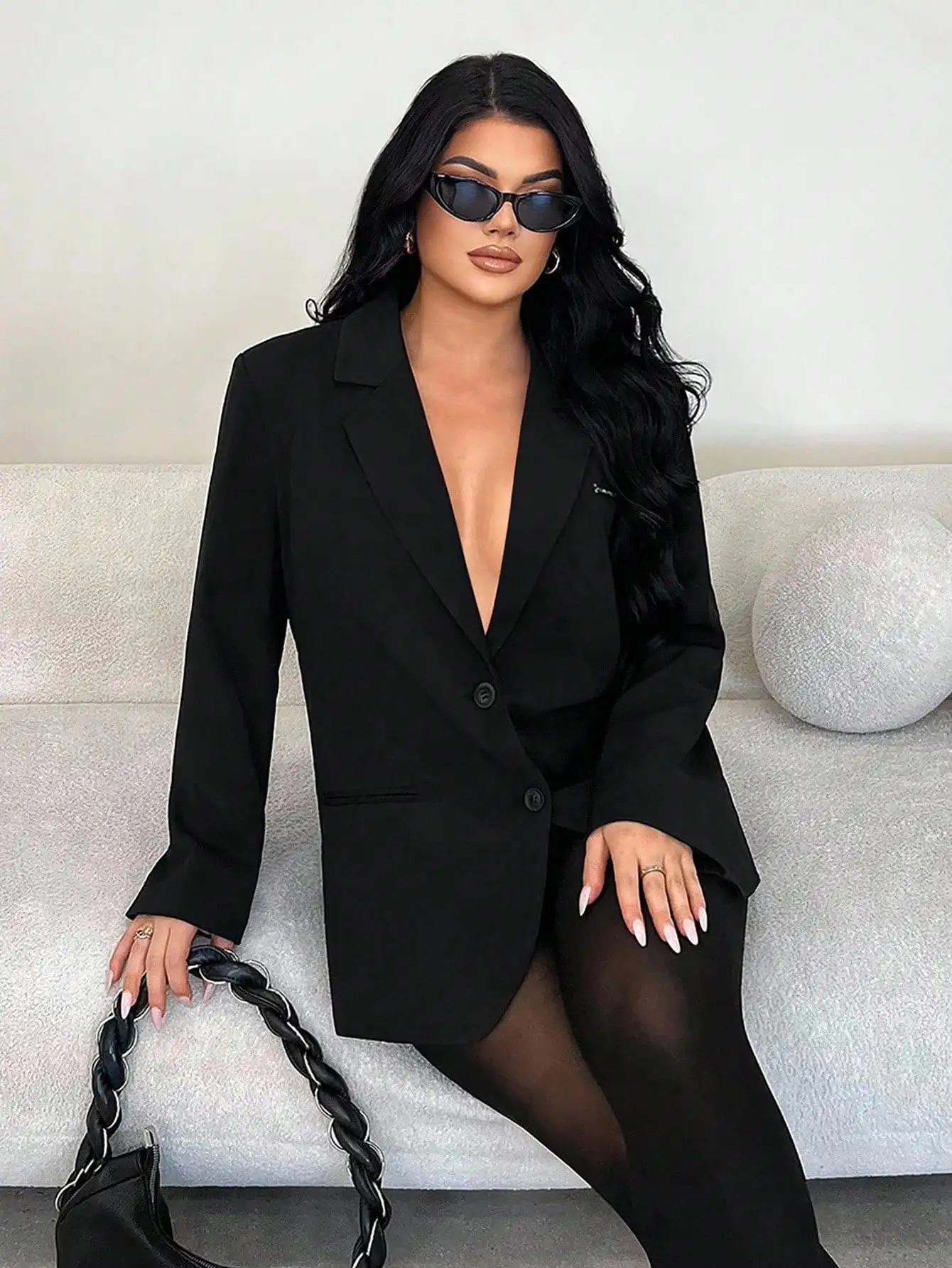 سترة نسائية سوداء كبيرة الحجم، بأسلوب أنيق وبسيط، متعددة الاستخدامات للمناسبات العادية والمكتب والحفلات والمواعيد