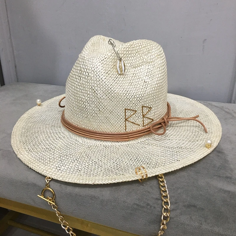 2022 new arrival women\'s straw hat with chain and pin in summer in the The beach by the sea